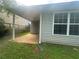 A single-story house with large window and small sheltered porch with concrete at 1241 Key Manor Ln, Lawrenceville, GA 30045