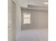 Bright bedroom with plush carpet, tray ceilings and ample natural light at 141 Frontier Way, Mcdonough, GA 30253