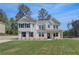 View of the home's front, showing landscaping and design elements at 141 Frontier Way, Mcdonough, GA 30253