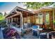 Outdoor living space with a swing, grill, and landscaped backyard at 197 Westbrook Rd, Carrollton, GA 30116