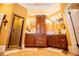 Bathroom featuring granite countertops, tiled floors, a glass shower and custom cabinetry at 197 Westbrook Rd, Carrollton, GA 30116