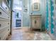 Charming bathroom featuring a decorative vanity and blue accents at 197 Westbrook Rd, Carrollton, GA 30116