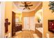 Bathroom boasting double doors, granite countertops, and a luxurious bathtub at 197 Westbrook Rd, Carrollton, GA 30116