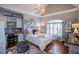 Light-filled bedroom featuring a charming desk, bed, and window at 197 Westbrook Rd, Carrollton, GA 30116