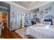 Lovely bedroom with a built-in desk, large bed, and plenty of natural light at 197 Westbrook Rd, Carrollton, GA 30116