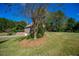 Home with a garage surrounded by mature trees, showcasing a private and serene setting at 197 Westbrook Rd, Carrollton, GA 30116