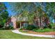 Well-maintained brick home with a manicured lawn and mature landscaping creating a welcoming curb appeal at 197 Westbrook Rd, Carrollton, GA 30116