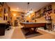 Entertainment-ready game room with a billiards table and sports decor at 197 Westbrook Rd, Carrollton, GA 30116