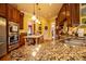 Kitchen with stainless steel appliances, granite countertops and wooden cabinetry at 197 Westbrook Rd, Carrollton, GA 30116