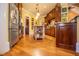 Well-lit kitchen with stainless steel appliances, granite countertops and hardwood floors at 197 Westbrook Rd, Carrollton, GA 30116