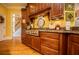 Kitchen with stainless steel appliances, custom cabinets, and granite countertops at 197 Westbrook Rd, Carrollton, GA 30116