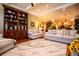 Open concept living room with built-in bookshelves, hardwood floors and lots of natural light at 197 Westbrook Rd, Carrollton, GA 30116