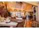 Spacious living room featuring hardwood floors, large windows, and comfortable seating arrangements at 197 Westbrook Rd, Carrollton, GA 30116