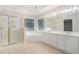 Bathroom showcasing large shower, tub, double vanity, and luxurious finishes at 5003 Village Terrace Dr, Dunwoody, GA 30338