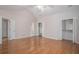 Spacious bedroom with vaulted ceiling, hardwood flooring, and large closet with built ins at 5003 Village Terrace Dr, Dunwoody, GA 30338
