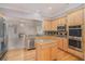 Spacious kitchen with stainless appliances, granite countertops, and a center island at 5003 Village Terrace Dr, Dunwoody, GA 30338