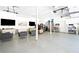 This garage offers a comfortable seating area and plenty of space for storage at 8175 Main St, Woodstock, GA 30188