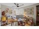 Well-lit home office featuring custom built-ins and stylish decor at 8175 Main St, Woodstock, GA 30188