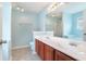 Main bath with dual sinks, and separate tub at 126 Wellbrook Ne Ct, Conyers, GA 30012