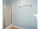 Modern bathroom featuring glass enclosed shower, tile flooring and a towel rack at 126 Wellbrook Ne Ct, Conyers, GA 30012