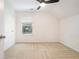 Bright bedroom featuring neutral walls and carpet flooring with a ceiling fan at 126 Wellbrook Ne Ct, Conyers, GA 30012