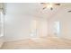 Large bedroom with vaulted ceiling and neutral carpet at 126 Wellbrook Ne Ct, Conyers, GA 30012