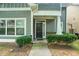 Inviting home with shaker siding, tidy landscaping, and sidewalk leading to the front door at 126 Wellbrook Ne Ct, Conyers, GA 30012