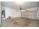Spacious garage with concrete flooring and ample storage at 126 Wellbrook Ne Ct, Conyers, GA 30012