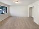 This bedroom features a window and a walk-in closet at 1480 Pine Log Ne Rd # D, Conyers, GA 30012