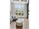 Bright living room with natural light, modern decor, and open layout at 3012 Flat Shoals Rd, Conyers, GA 30094