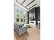 Stunning living room features high ceilings, gray tones and modern fireplace at 3012 Flat Shoals Rd, Conyers, GA 30094