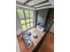 Aerial view of modern living room featuring tall windows, fireplace, and open layout at 3012 Flat Shoals Rd, Conyers, GA 30094