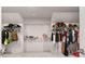 Spacious walk-in closet featuring ample shelving and hanging storage for clothes and accessories at 3012 Flat Shoals Rd, Conyers, GA 30094