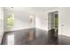Spacious bedroom with hardwood floors and natural light at 9071 Selborne Ln, Chattahoochee Hills, GA 30268