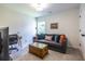 Relaxing bedroom featuring a sofa bed, desk, and a view of the outdoors at 1542 Idlewood Rd, Tucker, GA 30084