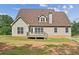 Exterior of a home featuring a back deck and backyard at 167 Gothards Creek Dr, Powder Springs, GA 30127