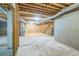 Spacious unfinished basement with concrete flooring and exposed ceiling, ready for personalization at 167 Gothards Creek Dr, Powder Springs, GA 30127
