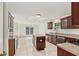 Spacious kitchen featuring an island, tile floors, and modern appliances at 167 Gothards Creek Dr, Powder Springs, GA 30127