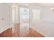 Bright living room with carpeted and hardwood floors and an open floorplan at 167 Gothards Creek Dr, Powder Springs, GA 30127