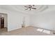 Spacious main bedroom boasts tray ceilings, ample natural light and neutral carpet at 167 Gothards Creek Dr, Powder Springs, GA 30127