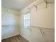 Walk-in closet featuring carpet, wire shelving and window at 167 Gothards Creek Dr, Powder Springs, GA 30127