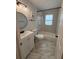Stylish bathroom featuring modern vanity, sleek fixtures, and a shower-tub combination at 3006 Dogwood Dr, Hapeville, GA 30354