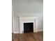Classic white fireplace with mantel, adding warmth and character to the living space at 3006 Dogwood Dr, Hapeville, GA 30354