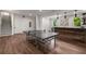Game room featuring a ping pong table, bar area, and stylish lighting, perfect for entertaining at 306 Pinecrest Ne Rd, Atlanta, GA 30342