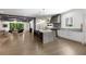 Open-concept living space offering kitchen with island, living room, and fireplace for modern living at 306 Pinecrest Ne Rd, Atlanta, GA 30342