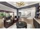 Open floor plan with bar area, living room, dining area, kitchen and light hardwood flooring at 306 Pinecrest Ne Rd, Atlanta, GA 30342