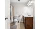 This bathroom features a shower/tub, a toilet, a vanity with a sink, and tile flooring at 3990 N Quail Dr, Douglasville, GA 30135