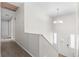 Bright entryway featuring white walls, chandelier, and a front door with decorative glass accents at 3990 N Quail Dr, Douglasville, GA 30135