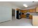Spacious kitchen featuring stainless steel appliances and ample cabinet space at 808 Plaintain Dr, Woodstock, GA 30188