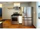 Modern kitchen with stainless steel fridge and gas range with hardwood floors giving a classic modern feel at 861 Marion Se Ave, Atlanta, GA 30312